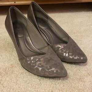 Silver heels, with a silver cheetah print on the front. Comfortable and cute!